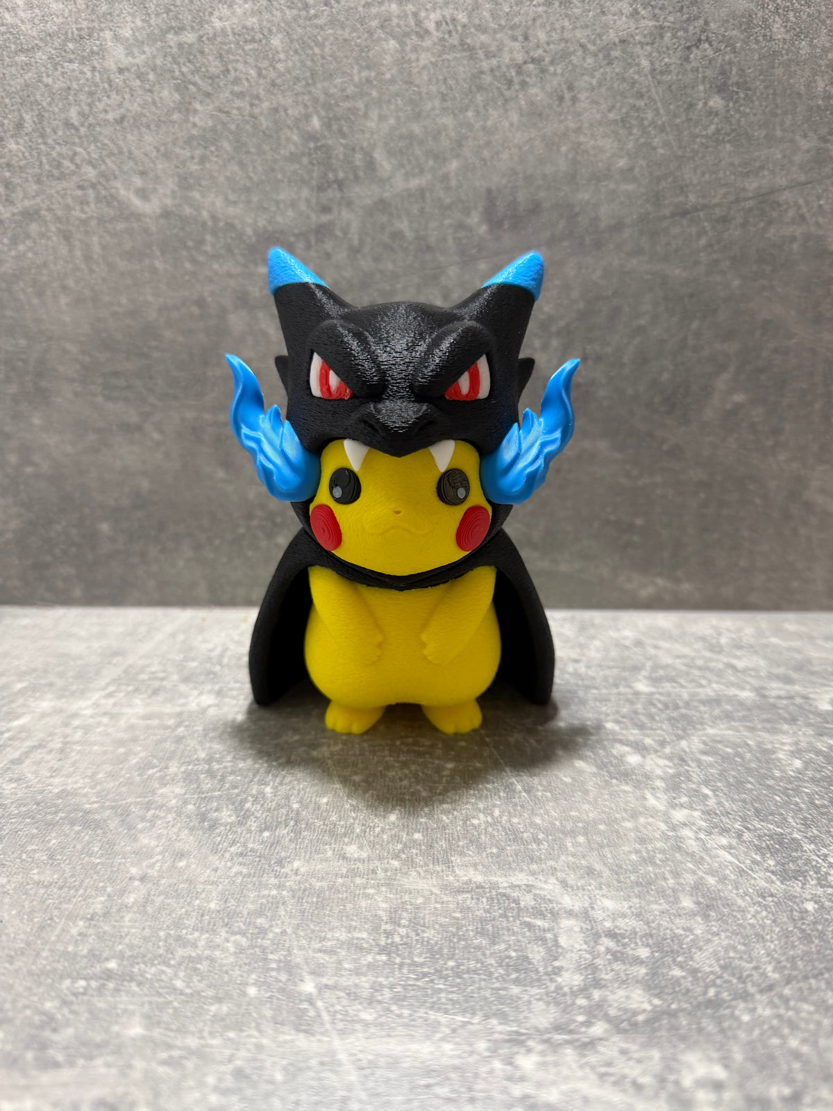 Pikachu Mega Charazard X Poncho